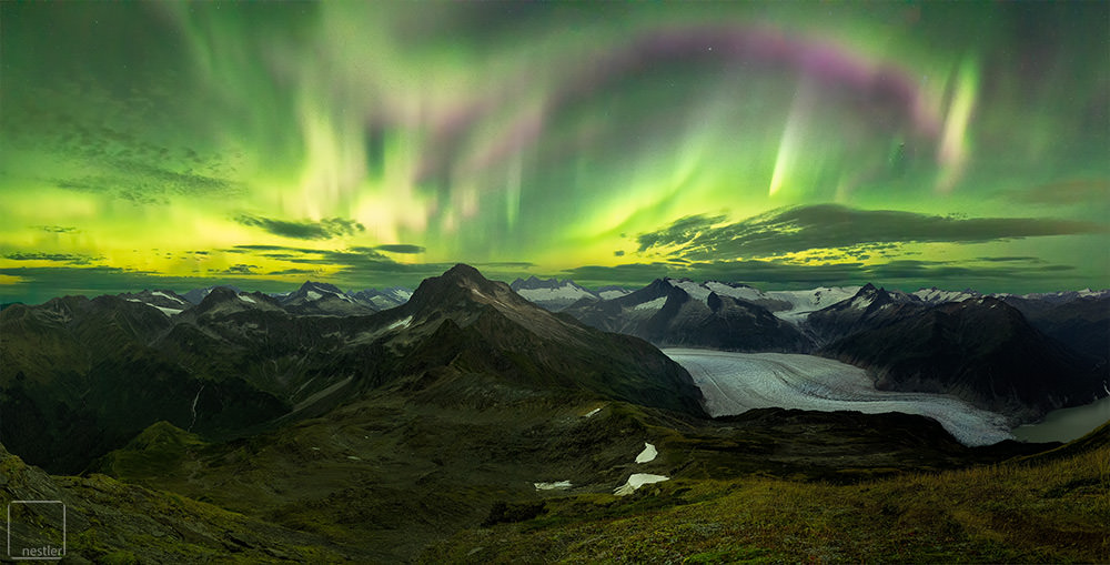 Glow - Northern Lights over the Mountains and Glacier of Alaska